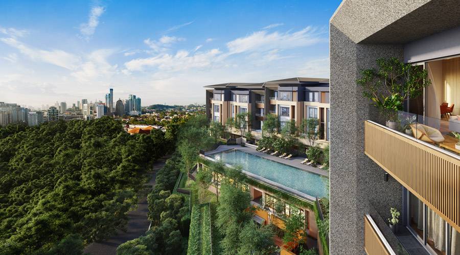 Modern luxury high-rise condo in Kuala Lumpur with infinity pool and city views, representing property options for MM2H Gold visa holders
